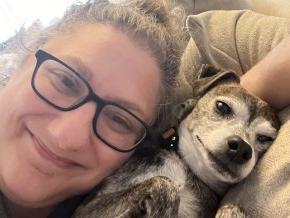 Kat Heiden and her dog in close-up